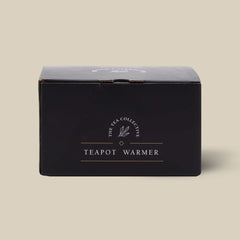 Glass and gold teapot warmer